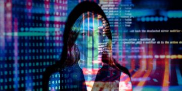 A woman with digital code projections on her face, representing technology and future concepts.