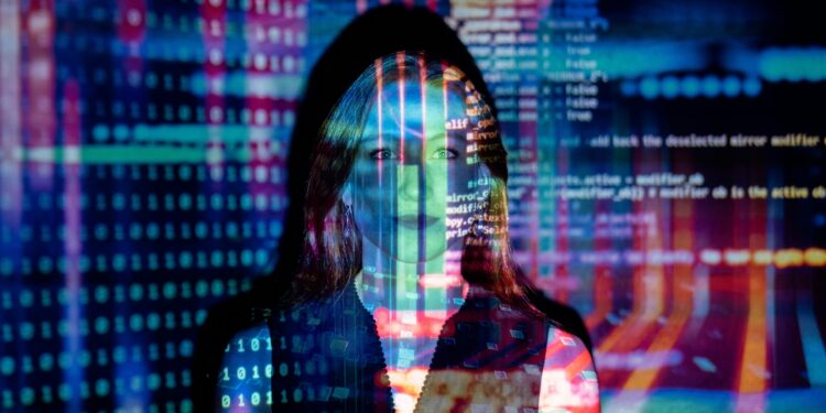 A woman with digital code projections on her face, representing technology and future concepts.