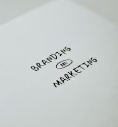 Minimalistic design showcasing 'branding and marketing' text for business strategy visuals.